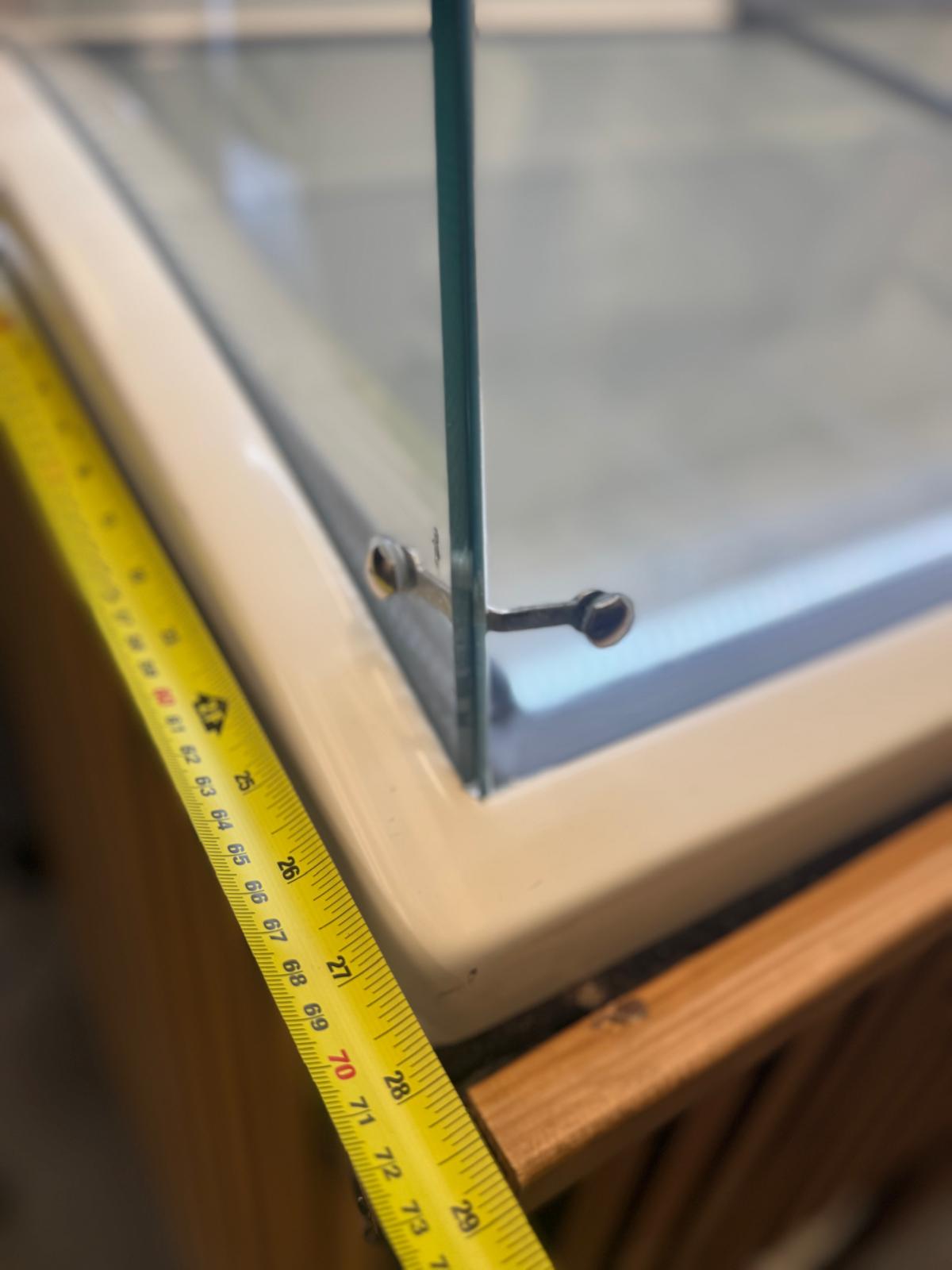 Approximate 70 cm depth measurement of ice cream display freezer